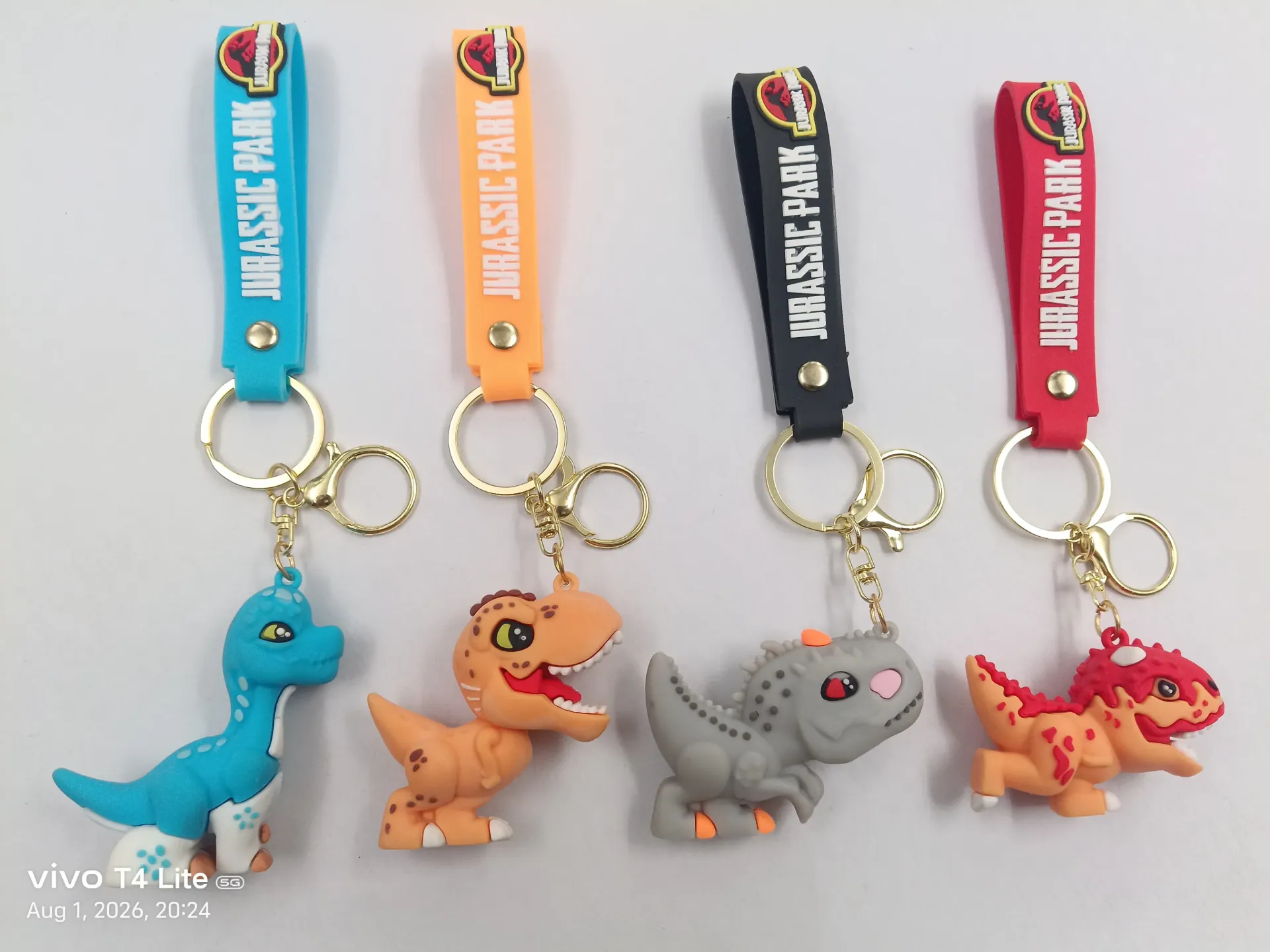 3D Silicon Dinosaur Keychain | Packet Contains 50 pieces of Different types and color of Dinosaurs Keychain ( With Packaging ) MOQ - 1 Box ( 50 Pieces )