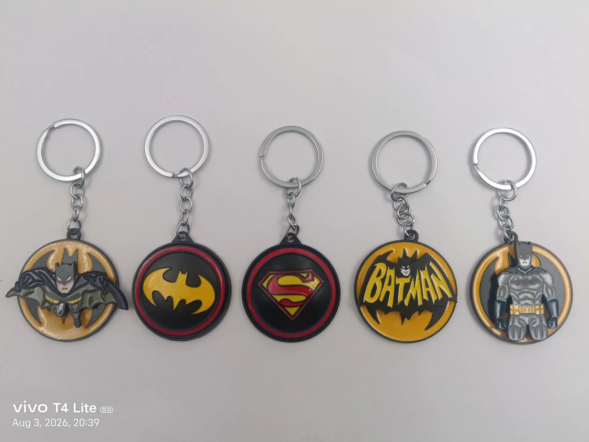 Super hero Metal Spinning Keychain | Packet Contains 50 pieces of Different types and color of Keychain ( With Packaging ) MOQ - 1 Box ( 50 Pieces )